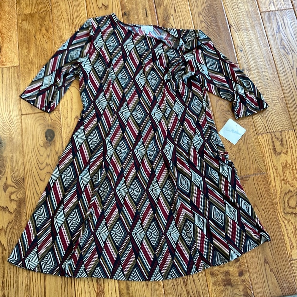 Olivia Matthews cocktail dress. Brand NWT! Sized XL women’s. Check pics